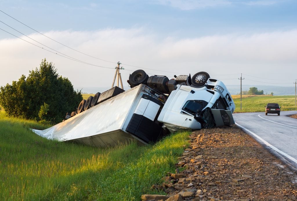 semi-truck rollover accident